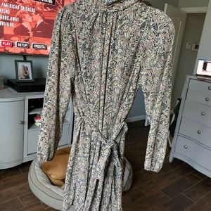 Long sleeved, darling detailed dress with long tie